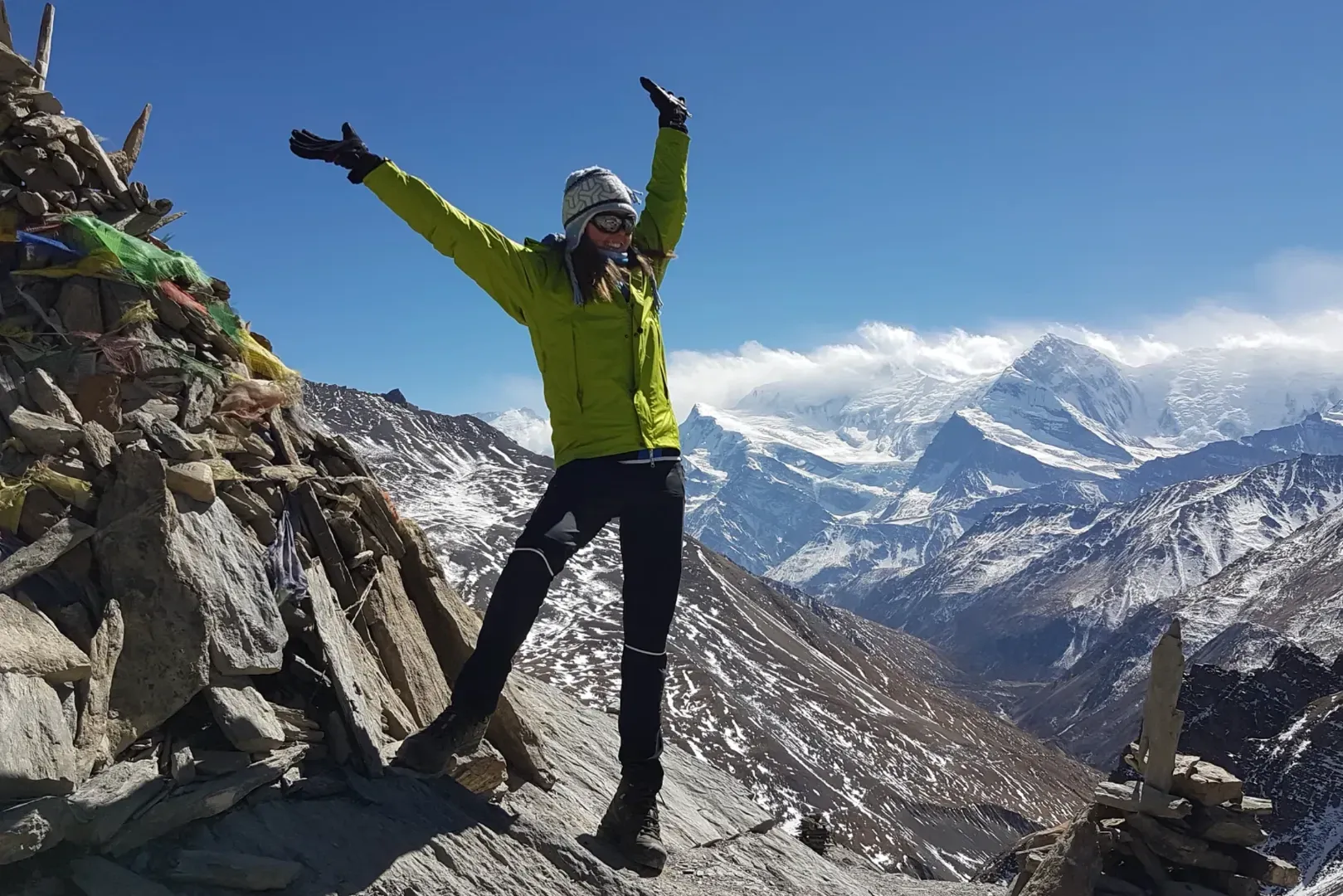 Romi on a mountain summit in Nepal